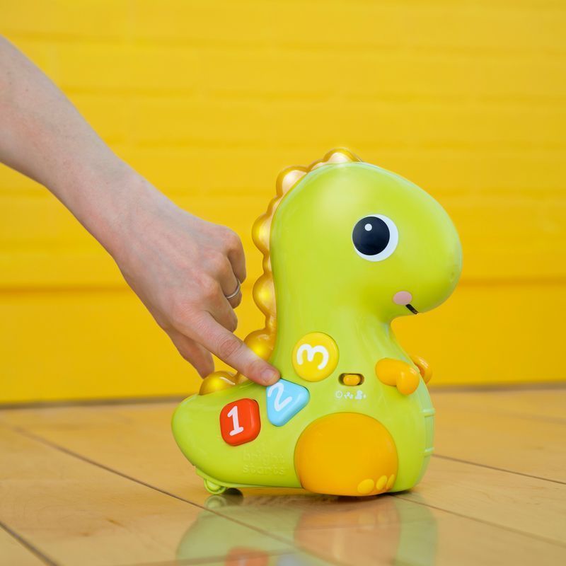 Игрушка музыкальная Bright Starts "Go, Go, Dino", от 6 - ти мес
