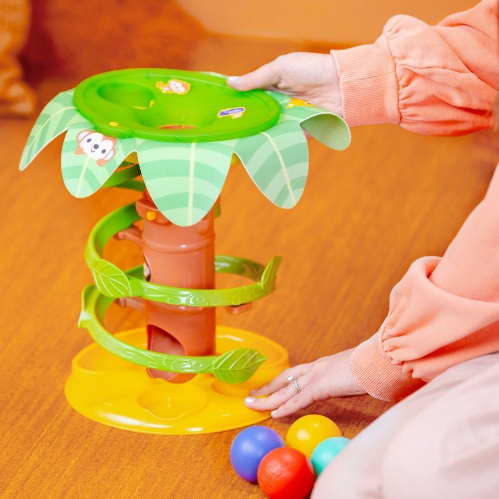 Музична іграшка Bright Starts "Tropical Twirl", від 6 - ти міс